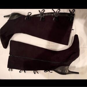 Women’s sz 9 black suede boots with bows down the back.Worn few times like new!